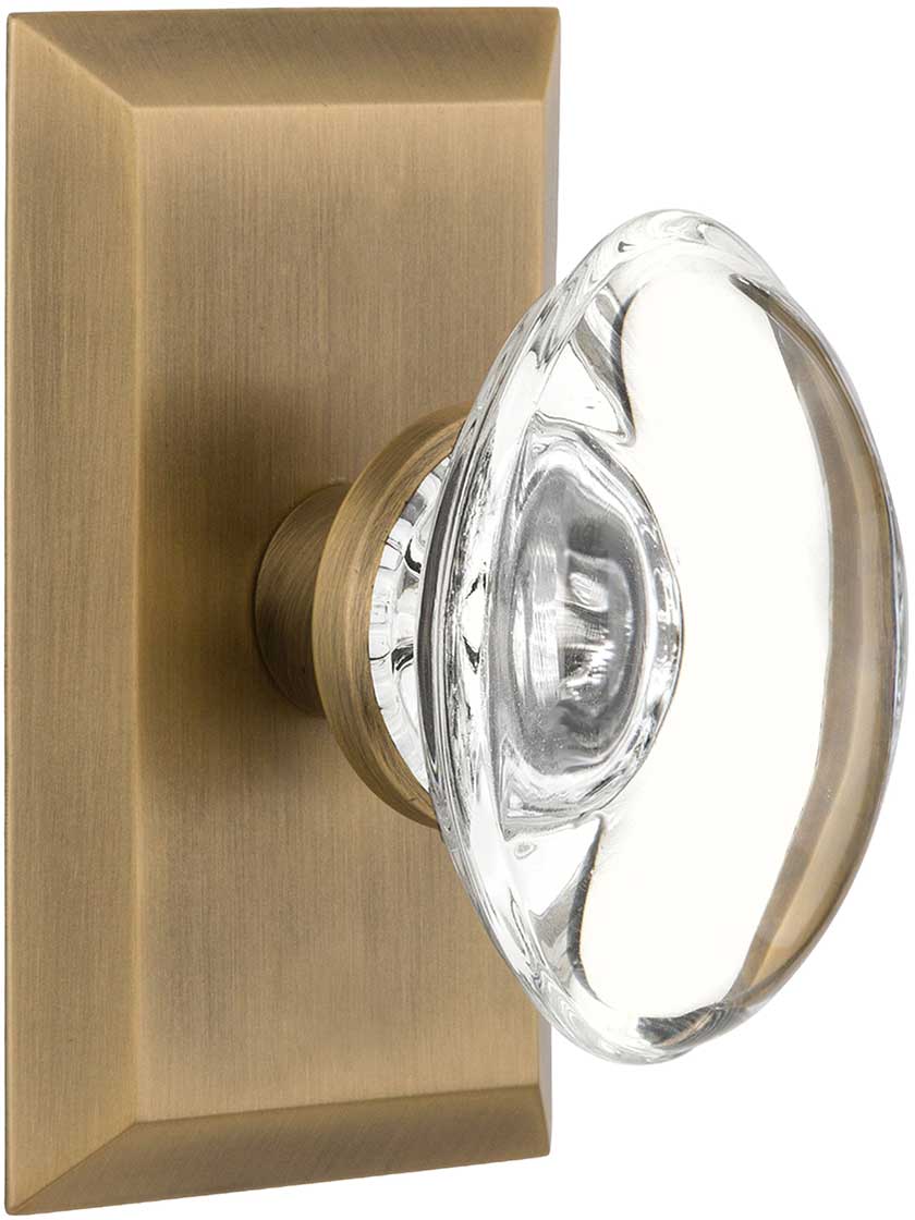New York Rosette Door Set Oval Clear-Crystal Glass Knobs in Antique Brass.